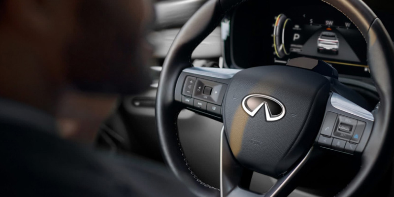 Close-up of an Infiniti steering wheel.