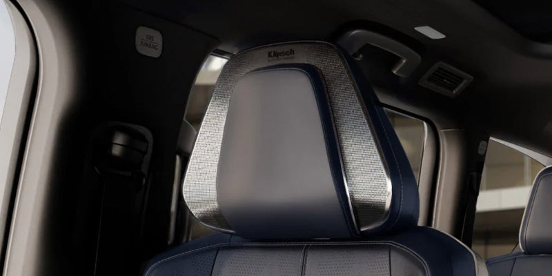 2027 INFINITI QX65 luxury headrest interior detail.