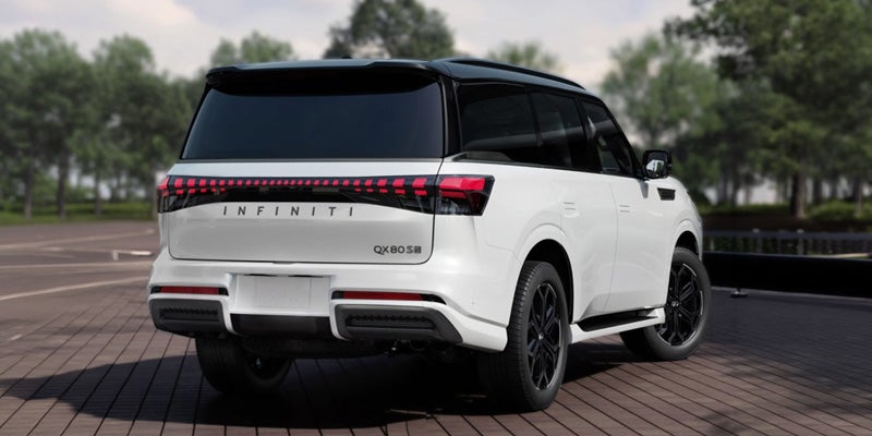 White 2027 INFINITI QX65 SUV rear exterior view.