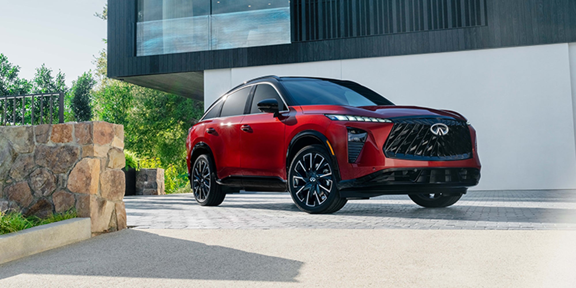 Red 2027 INFINITI QX65 SUV exterior front view.